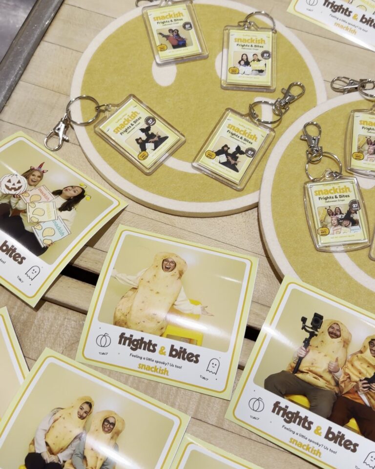 Trays of custom Snackish Frights and Bites photo keychains and 4x4 keepsake prints