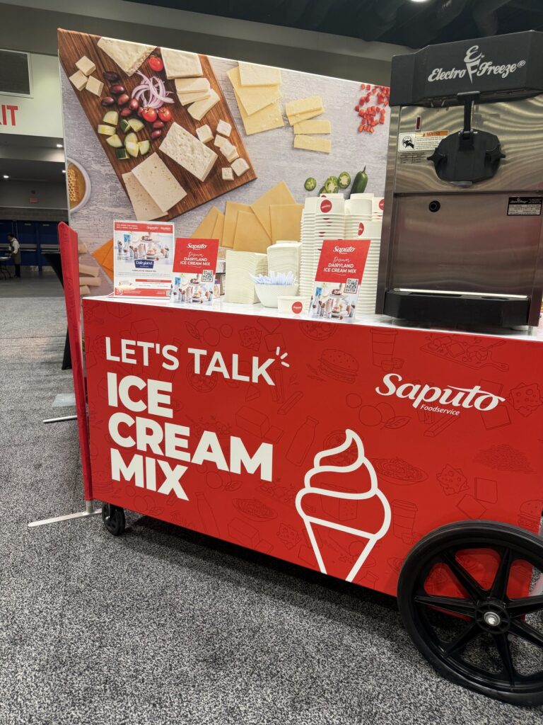 Soft serve ice cream cart with custom Saputo wrap at the Gordon Food Service Show in Vancouver